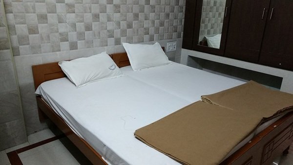 Deluxe Room accommodation at Vasavi Bhavan Tirumala